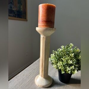 A vintage Renoir marble candleholder.